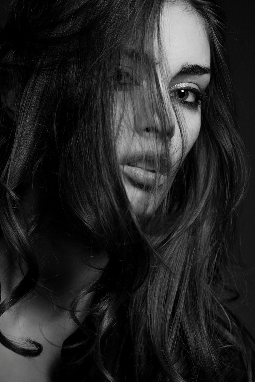 a black and white photo of a woman with long hair, a black and white photo, by Etienne Delessert, digital art, fashion model face, full face close up portrait, sexy girl with dark brown hair, hiding