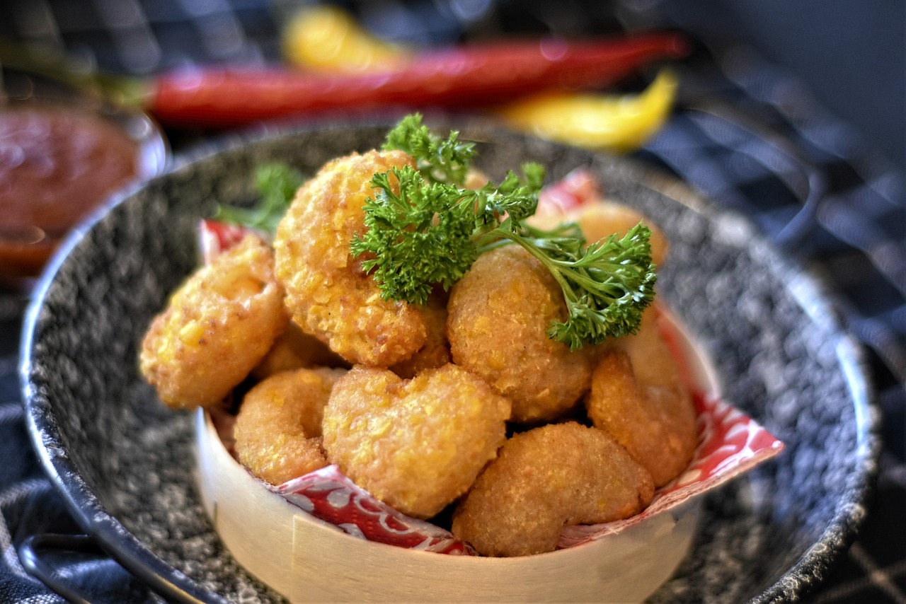 a close up of a bowl of food on a table, jajaboonords flipjimtots, nugget, professional food photo, sasai ukon masanao