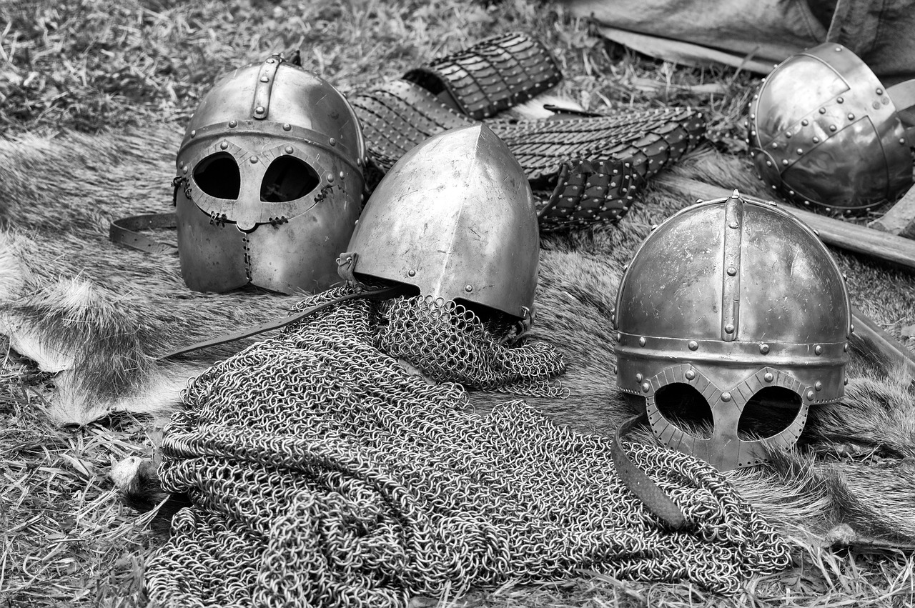 a couple of helmets sitting on top of a pile of fur, a portrait, by Arthur Sarkissian, trending on pixabay, fine art, chainmail, richard iv the roman king photo, b&w!, encampment
