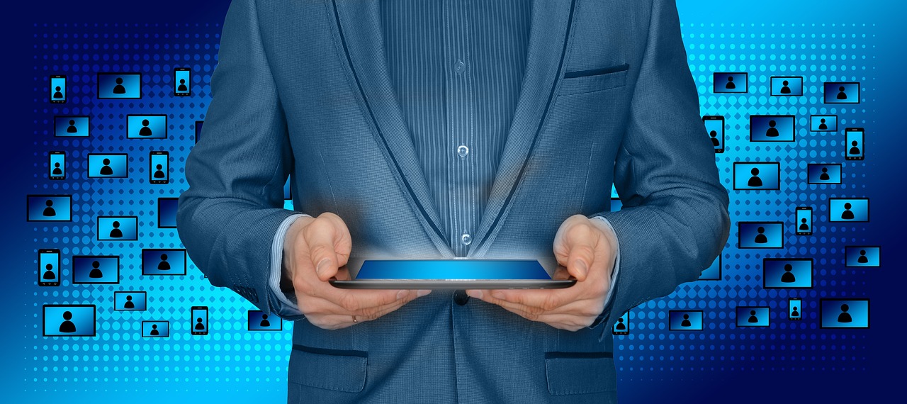 a man in a suit holding a tablet computer, a digital rendering, pixabay, wearing blue jacket, corporate phone app icon, intriciate detail, hands retouched
