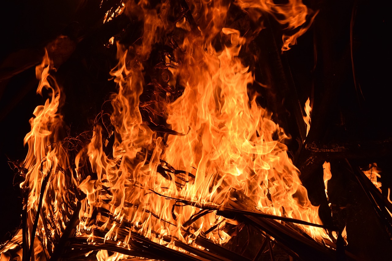 a fire that is burning in the dark, a picture, by Rodney Joseph Burn, shutterstock, a wooden, pandemonium, background image, full length shot