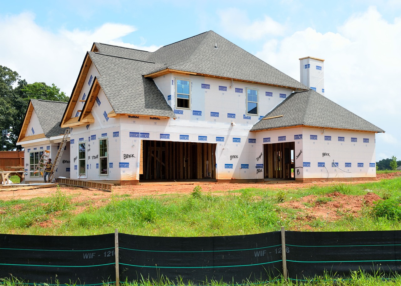 a house under construction under a blue sky, a photo, by John Armleder, pixabay, front elevation view, better homes and gardens, exterior wide shot, panels