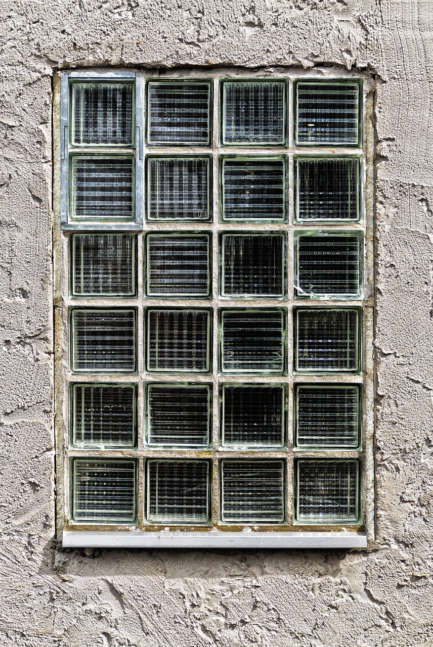 a close up of a window on a building, modernism, grid of styles, cast glass, prison cell, neighborhood outside window