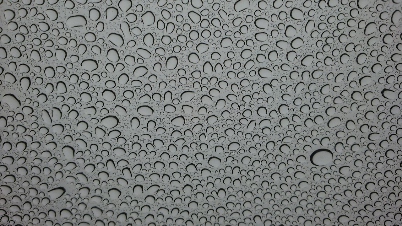 a close up of water droplets on a surface, inspired by Vija Celmins, complex pattern, matte gray background, roof background, closeup!!