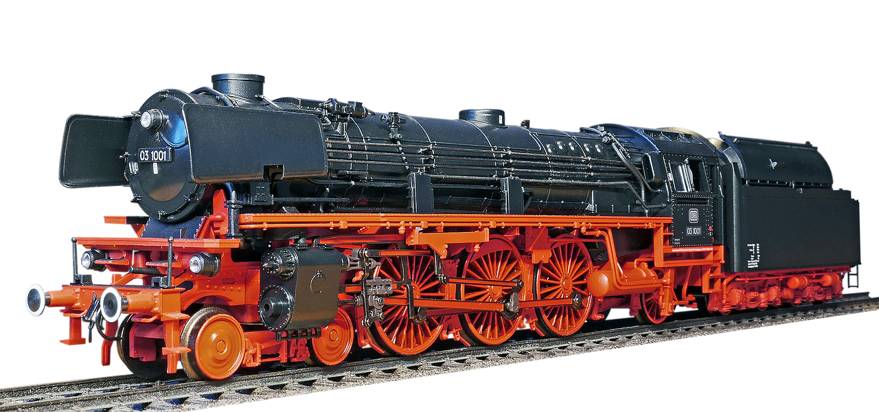 a close up of a train on a train track, a digital rendering, by Jürg Kreienbühl, zbrush central, figuration libre, orange and black, big engine, replica model, three quarter profile