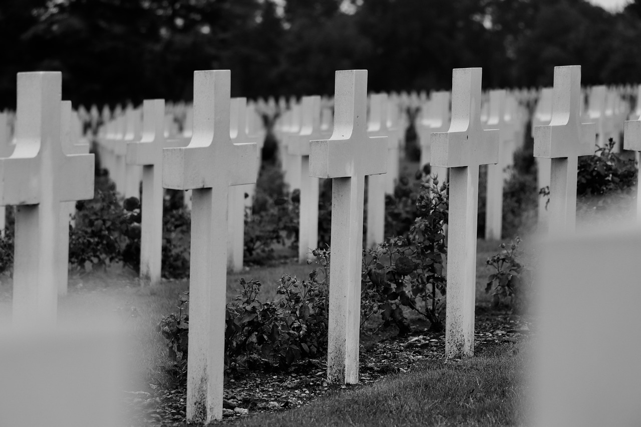 a black and white photo of a cemetery, by Etienne Delessert, unsplash, wounded soldiers, closeup photo, july 2 0 1 1, cross haching