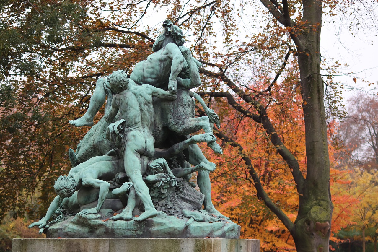 a statue of a man surrounded by animals in a park, by Karel Štěch, muted fall colors, satyr, soldiers charging in, alphonce mucha