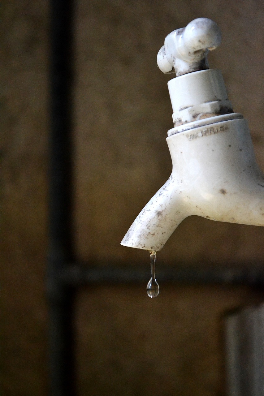 a water faucet with a drop of water coming out of it, afp, deteriorated, full res, bangalore