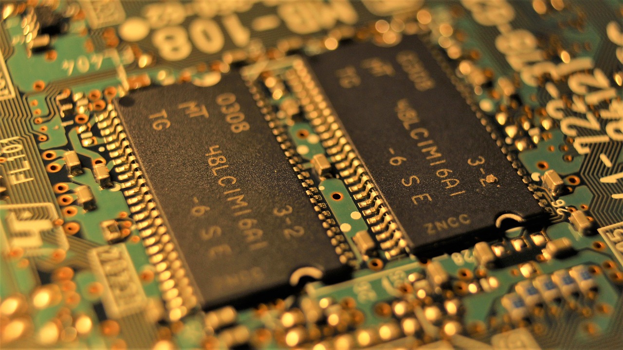 a close up of a printed circuit board, flickr, subtitles, computer chips, liquid gold, angled shot