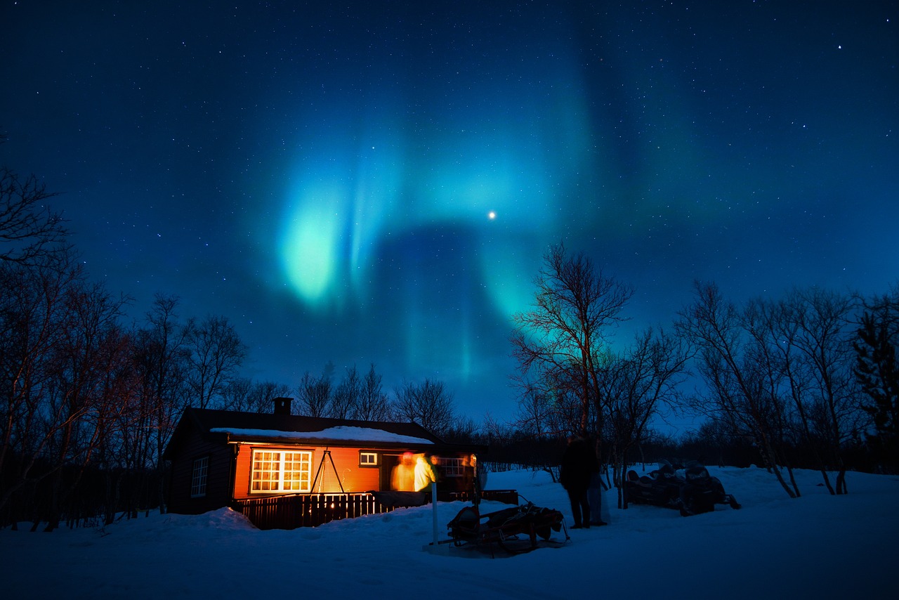 a cabin is lit up by the northern lights, by Anato Finnstark, hurufiyya, discovered photo, rays of blue moonlight, 6 4 0, solar flares