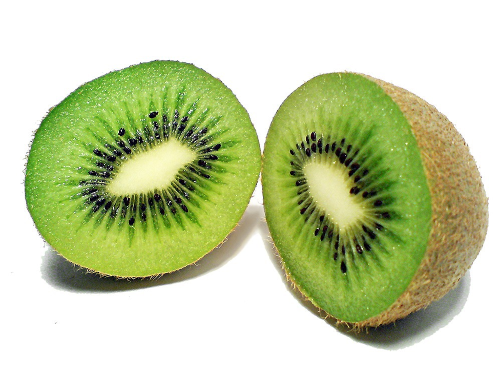 a kiwi cut in half on a white surface, pixabay, hurufiyya, grain”, its name is greeny, “berries, elaborate composition