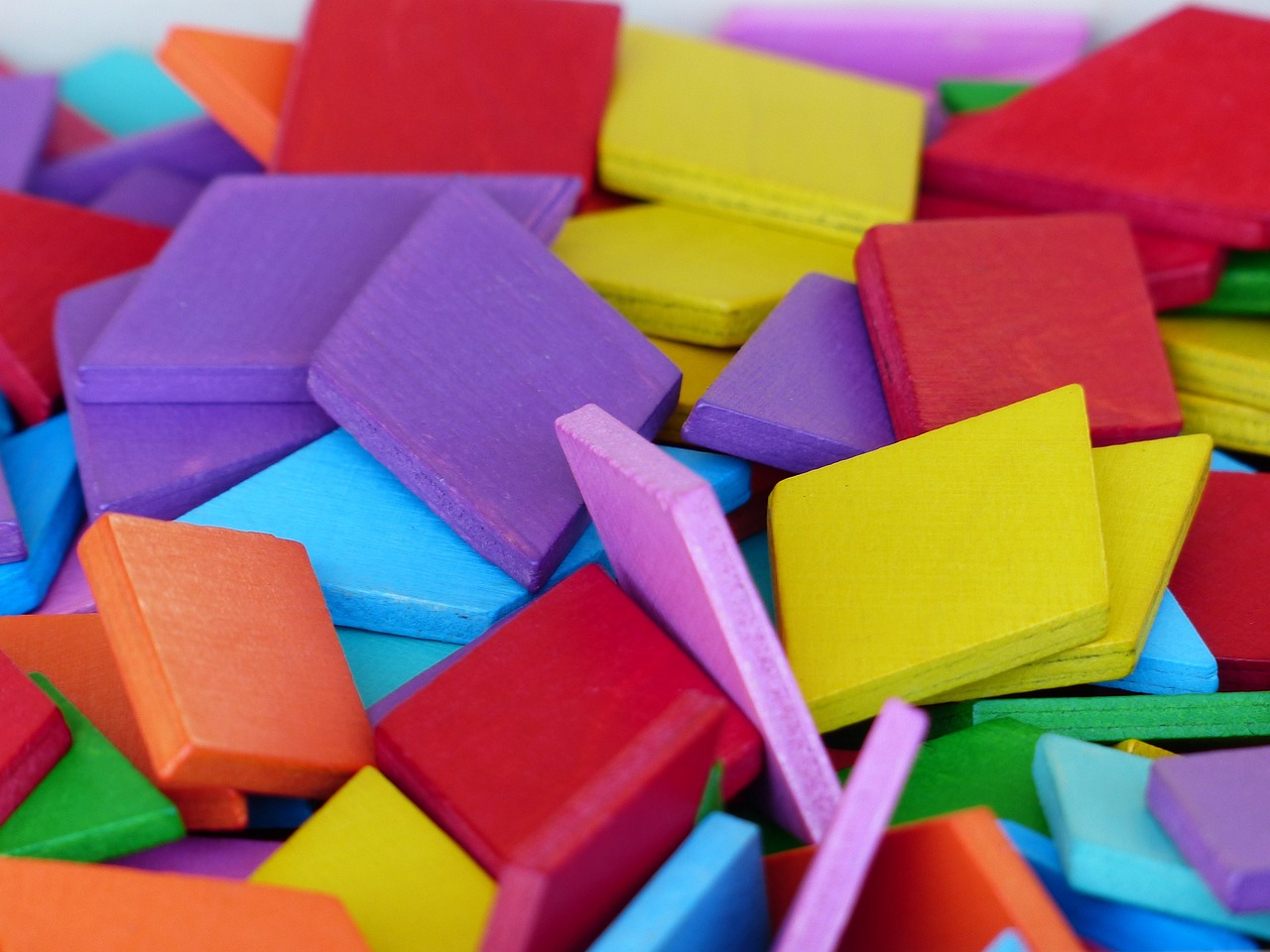 a pile of colorful wooden blocks sitting on top of each other, a picture, pexels, color field, square shapes, colorful gems, wallpaper - 1 0 2 4, floating pieces