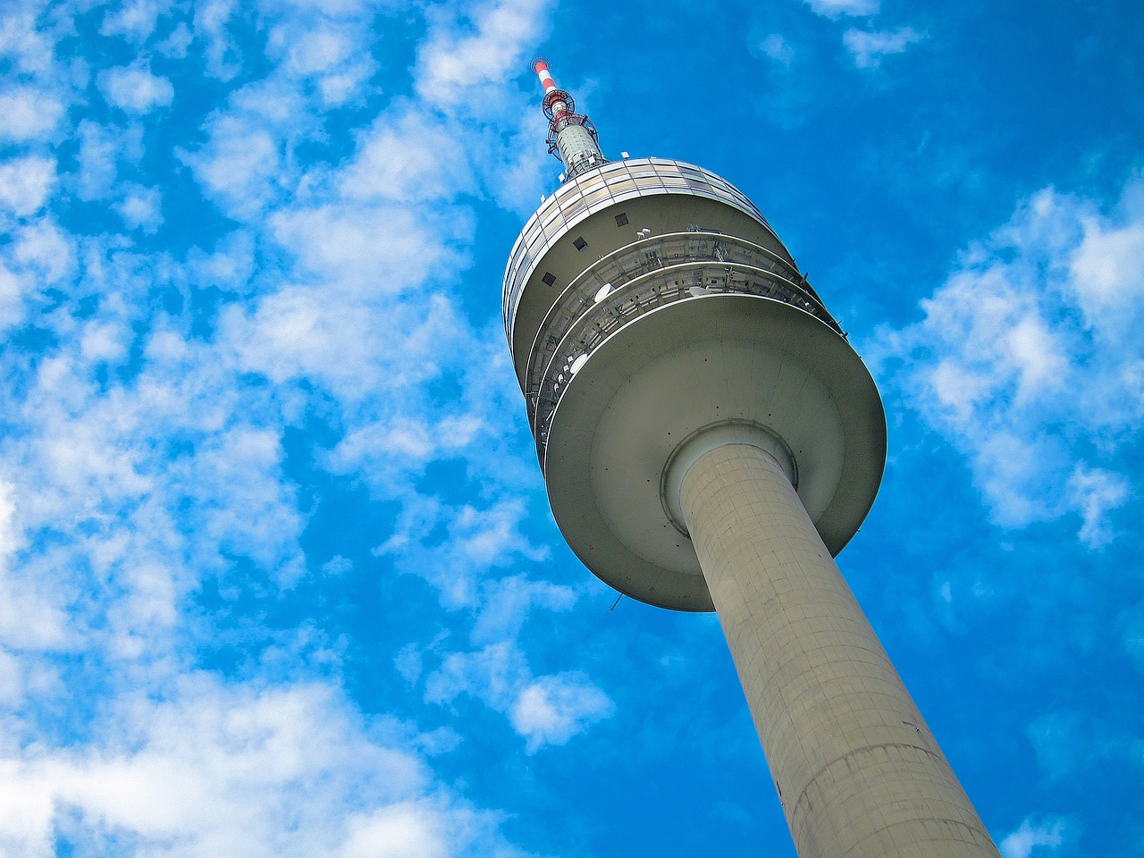 a tall tower with a blue sky in the background, a picture, by Hans Schwarz, shutterstock, observation deck, show from below, radio, professionally designed