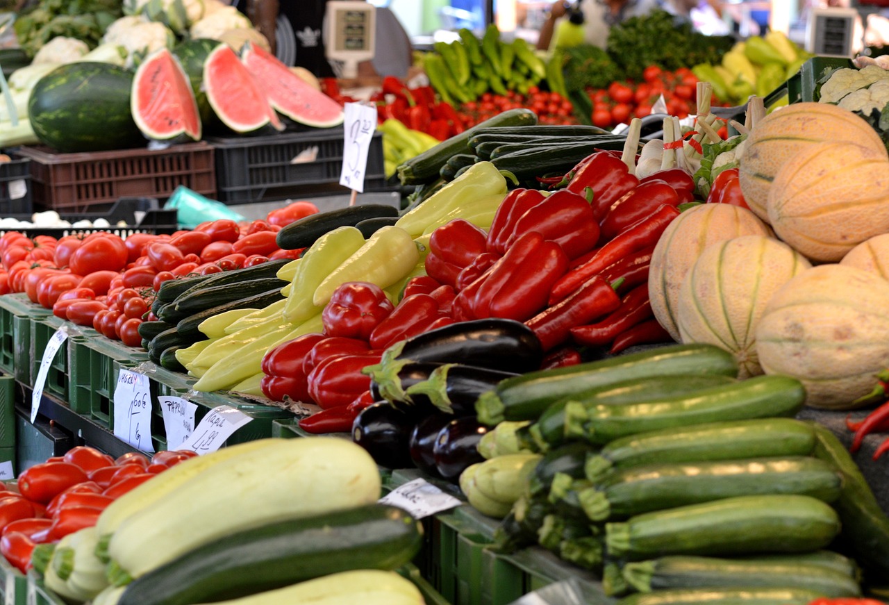 a market filled with lots of different types of vegetables, renaissance, high res photo, istockphoto, vibrant red and green colours, stock photo