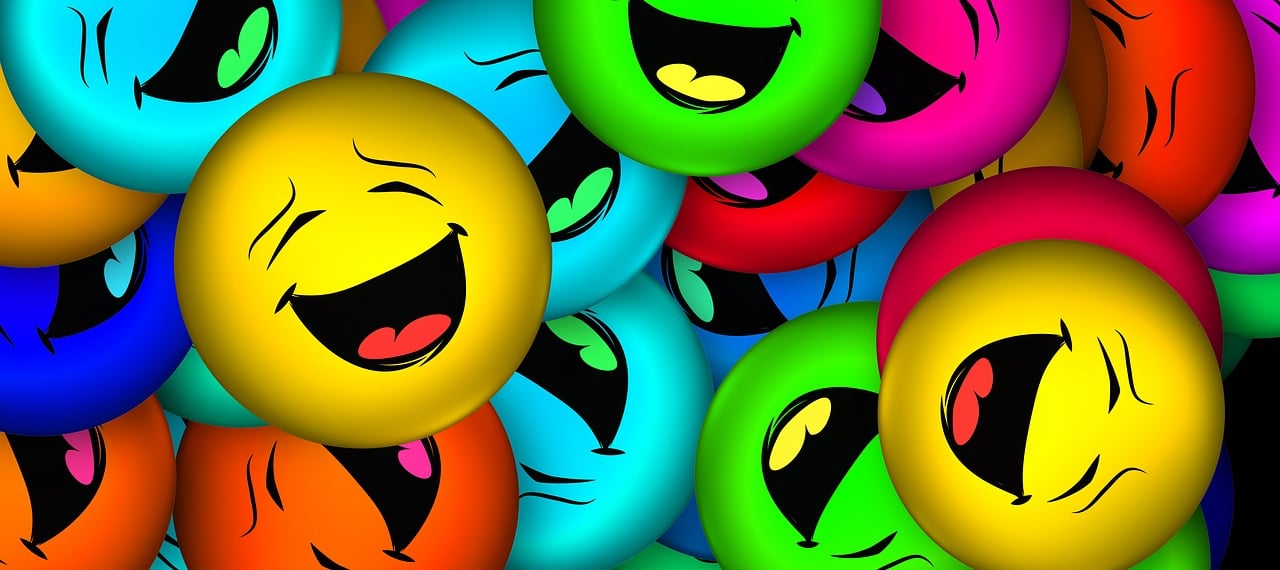 a bunch of colorful balloons with faces on them, a picture, by Dietmar Damerau, trending on pixabay, evil insane smiling laugh, mobile wallpaper, avatar image