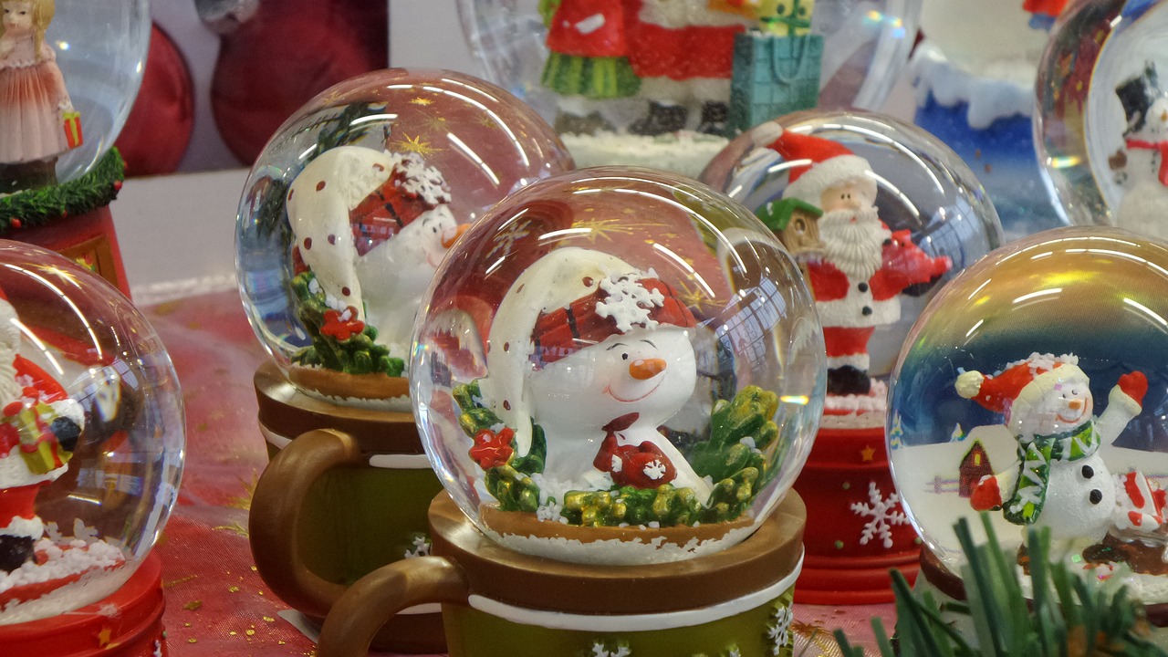 a group of snow globes sitting on top of a table, a photo, figuration libre, hot cocoa drink, super detailed image, high res photo, close up photo