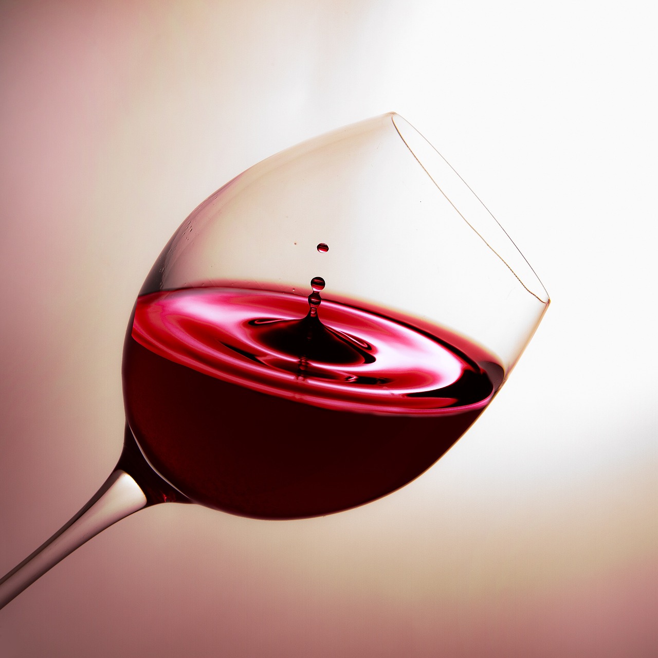 a wine glass with a liquid drop in it, by Jan Rustem, red ink sharp focus, high detail product photo