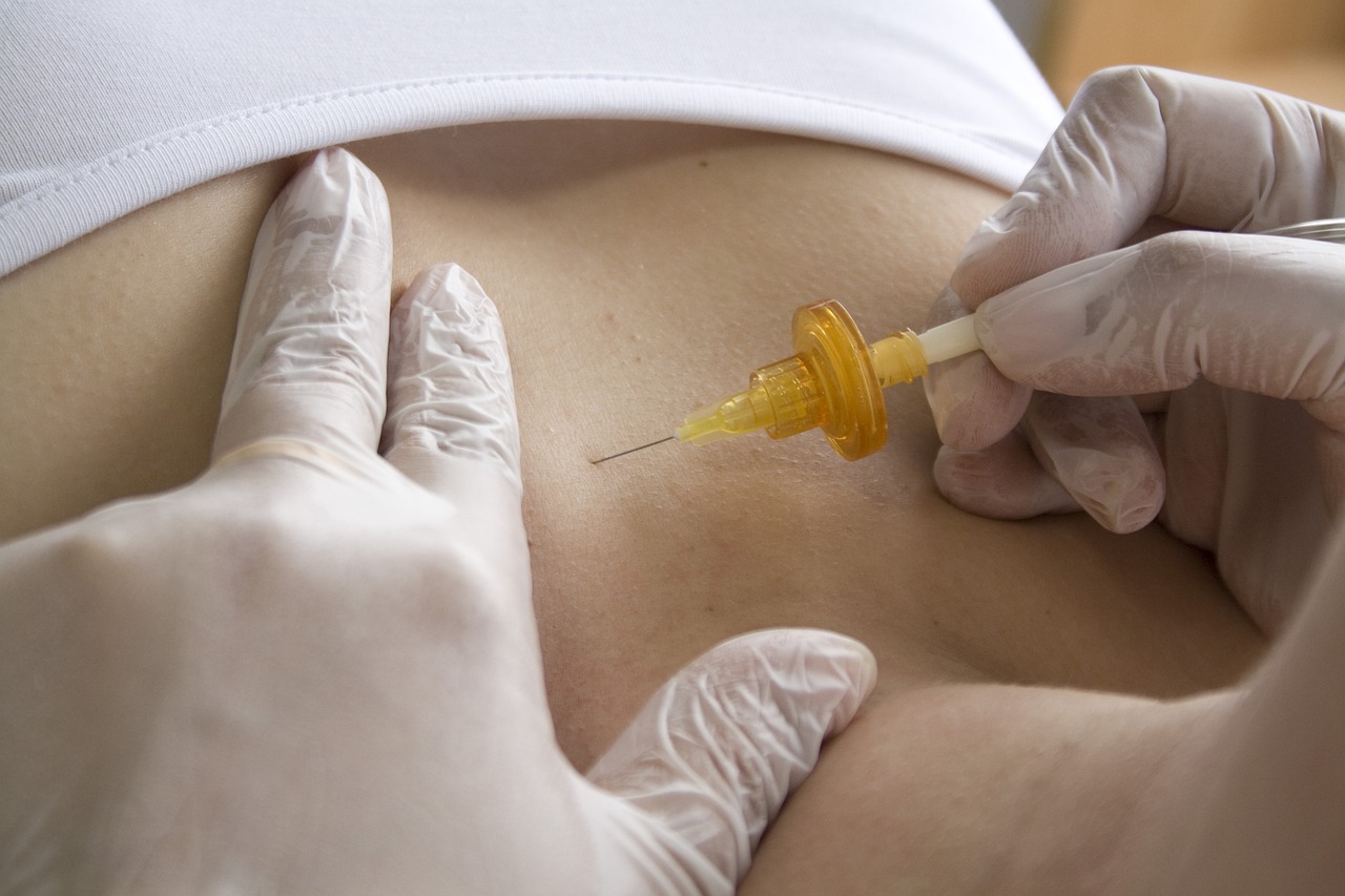 a woman getting an injection from a doctor, by Jason Felix, shutterstock, renaissance, belly button showing, the cytoplasm”, honey, photograph credit: ap