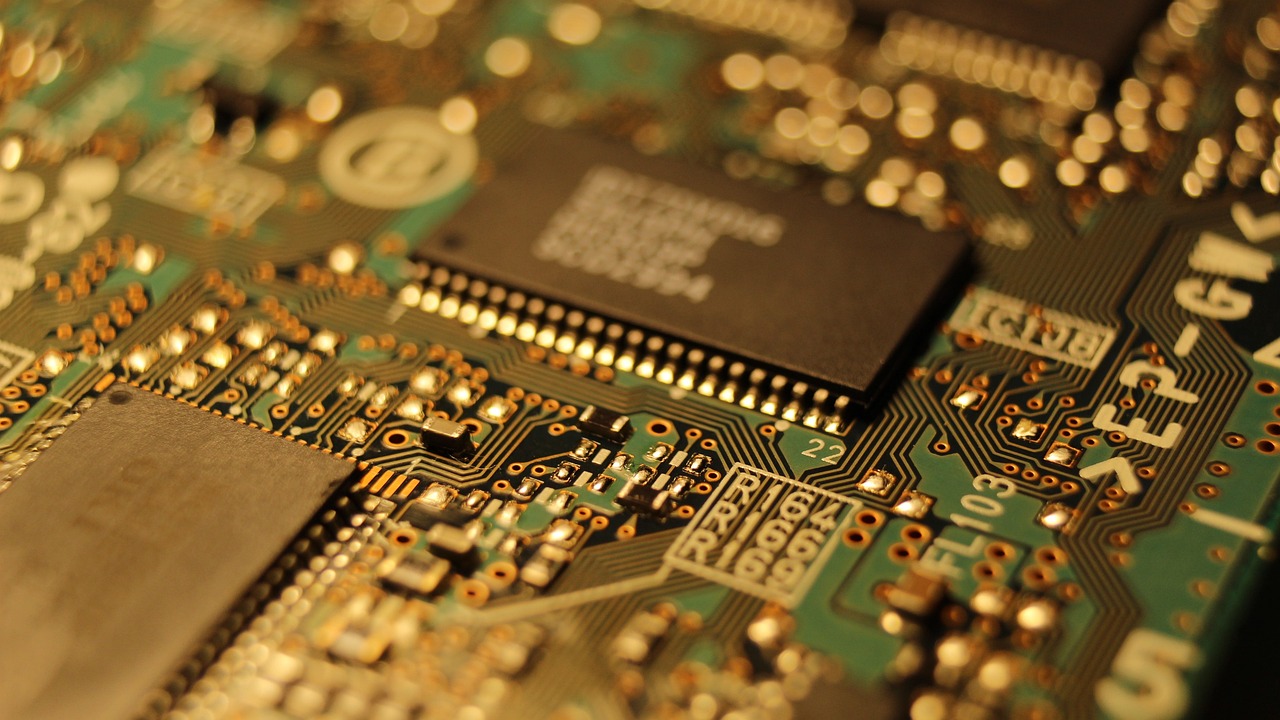 a close up of a computer mother board, a macro photograph, by Judith Gutierrez, flickr, gold, cardboard, a detailed, sf