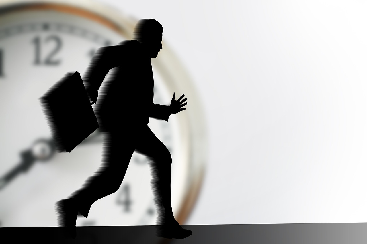 a silhouette of a man walking in front of a clock, a digital rendering, trending on pixabay, running fast towards the camera, extreme motion blur on people, advertising photo, stock photo