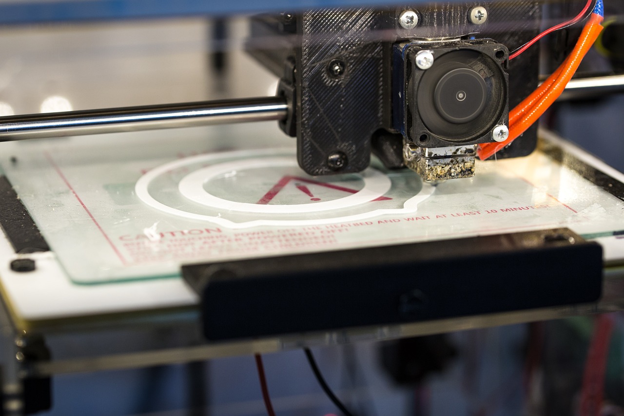 a close up of a 3d printer on a table, by Matija Jama, shutterstock, plasticien, screen printed, usa-sep 20, back towards camera, bottom angle