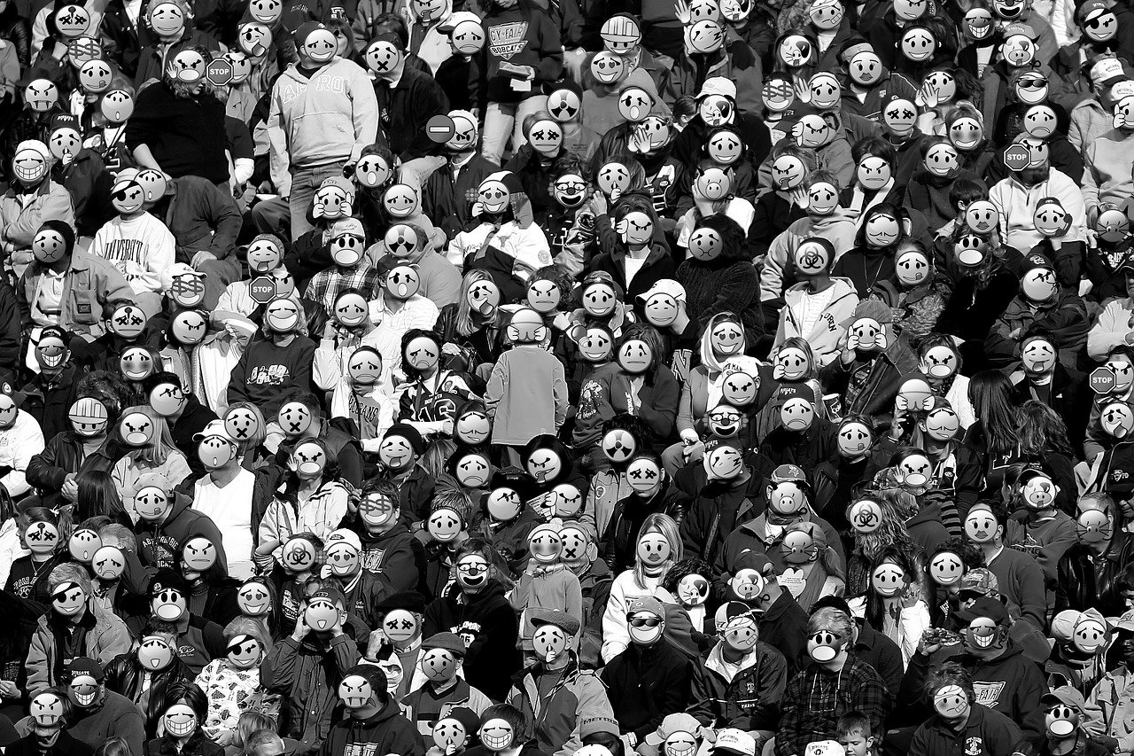 a black and white photo of a crowd of people wearing clown masks, reddit, precisionism, award-winning photo!!!!, football hooligans, joe webb, pareidolia