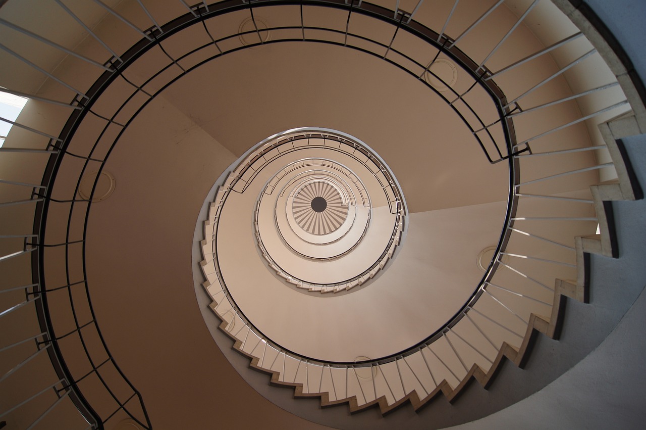 a spiral staircase in a building with a skylight, by János Nagy Balogh, flickr, biedermeier, fine simple delicate structure, pulled into the spiral vortex, nonagon infinity