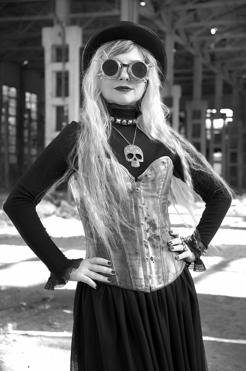 a black and white photo of a woman wearing a corset, a portrait, by Andrei Kolkoutine, reddit, gothic art, post apocalyptic san francisco, with sunglasses, metallic skeleton, portrait of a slightly rusty