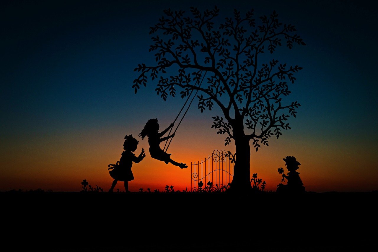 a couple of kids on a swing next to a tree, by Krzysztof Boguszewski, pixabay contest winner, conceptual art, there is midnight sunset, cute girls, anthropomorphic silhouette, photograph of enchanted garden