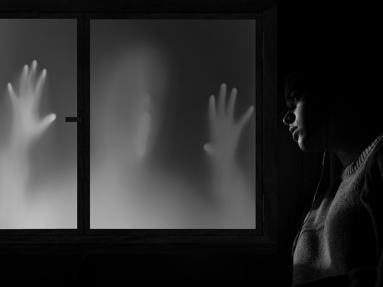 a woman standing in front of a frosted window, inspired by Katia Chausheva, pixabay, conceptual art, scary night, glowing hands, room mono window, ghost faces