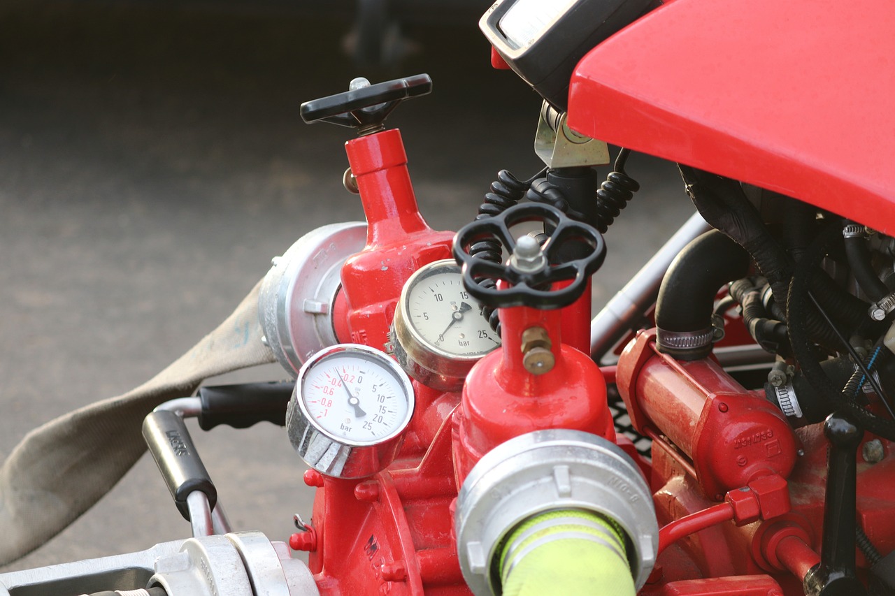 a close up of a red motorcycle with a gauge, a photo, firefighting gear, combine, water pipe, very accurate photo