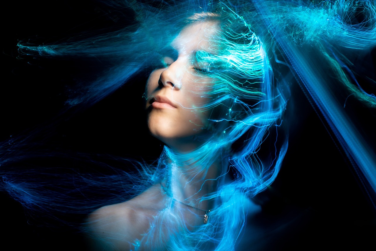 a close up of a woman with blue hair, digital art, by Eugeniusz Zak, shutterstock, electricity aura, ethereal lighting - h 640, photo of a beautiful woman, packshot
