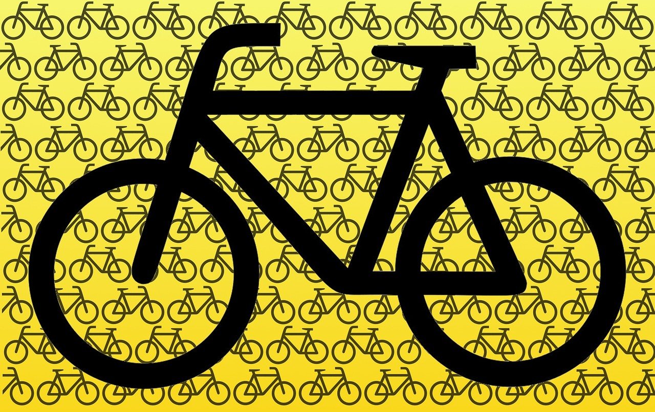 a black silhouette of a bicycle on a yellow background, a digital rendering, by Carey Morris, pixabay, icon pattern, banner, variations, high contrast!