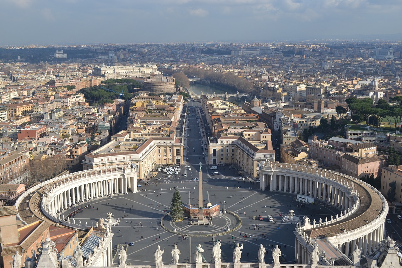 a view of a city from the top of a building, by Cagnaccio di San Pietro, shutterstock, vatican, stock photo