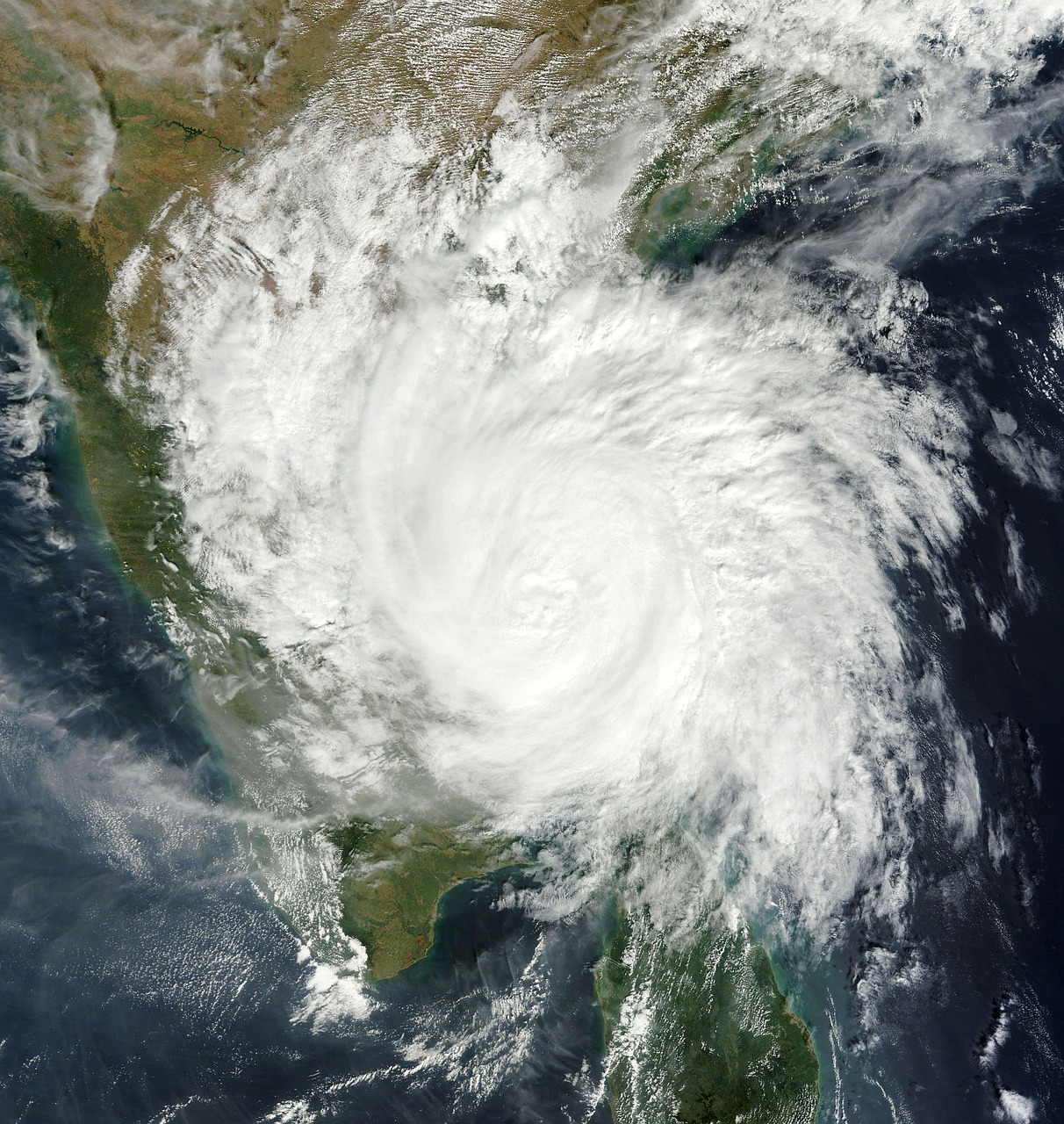 a satellite image of a hurricane in the middle of the ocean, samikshavad, tiger, closeup photo, narasimha, radial