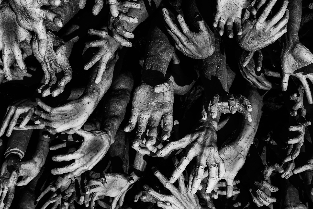 a black and white photo of a bunch of hands, by Ai Weiwei, pexels, surrealism, the gates of hell, anton semenov, horde of zombies, closeup of arms