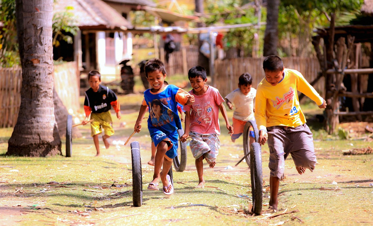 a group of young children playing a game of soccer, a picture, flickr, sumatraism, cycling!!, instagram post, a beautiful, a colorful