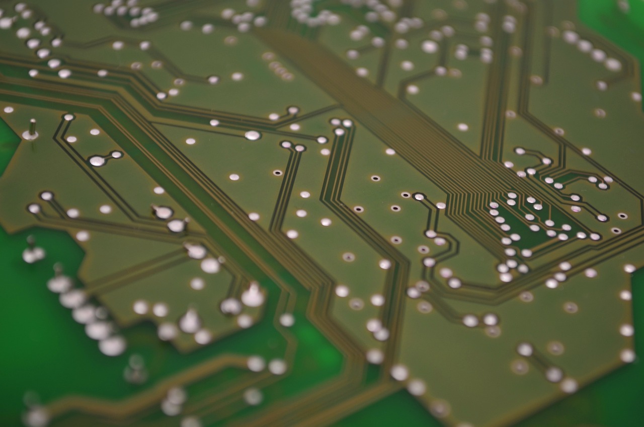 a close up of a printed circuit board, by Dan Christensen, detailed 4 k photo, bottom angle, backlit, computer