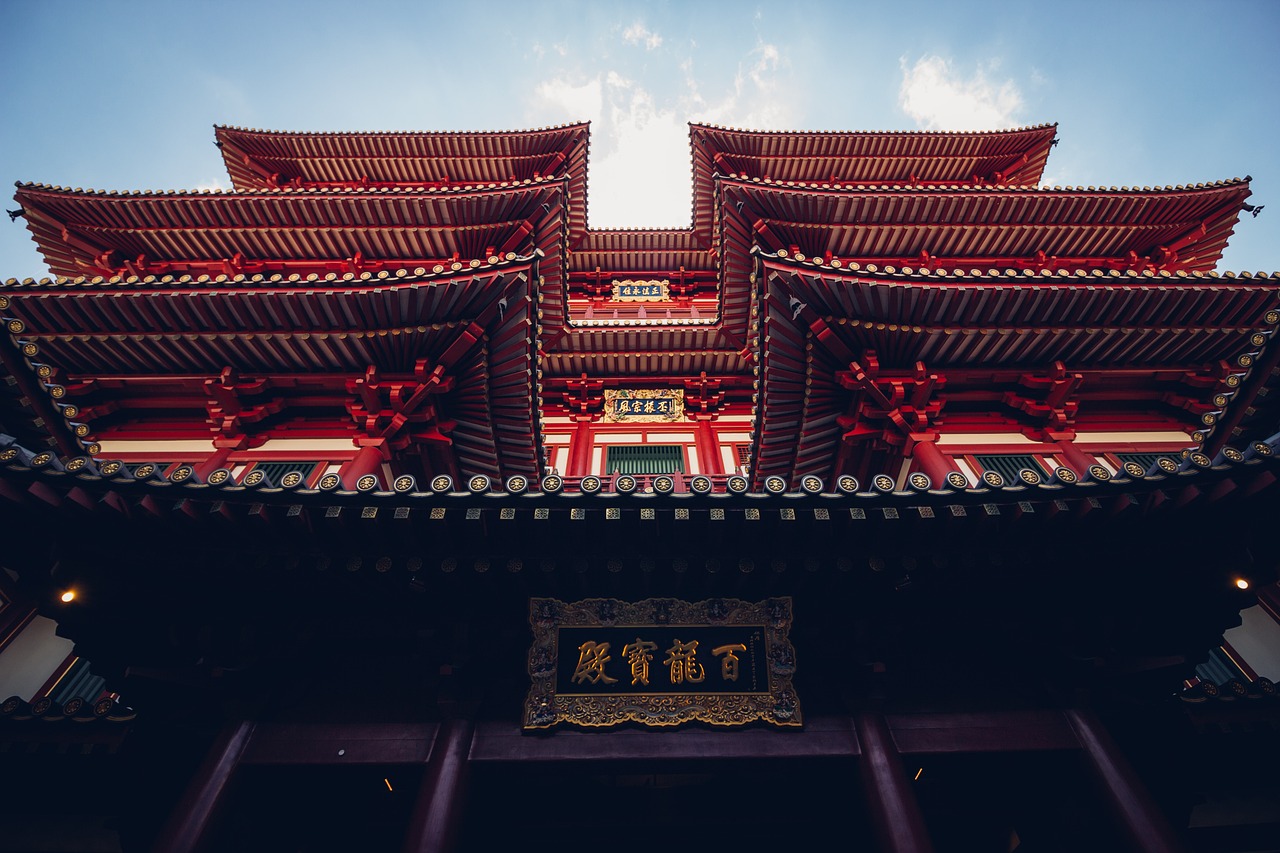 a close up of a building with a sky background, inspired by Itō Jakuchū, pexels contest winner, shin hanga, chinese temple, singapore ( 2 0 1 8 ), the red citadel, low angle wide shot
