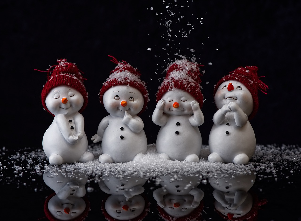 a group of snowmen standing next to each other, a picture, by Yang Borun, shutterstock, figuration libre, 4k polymer clay food photography, hear no evil, on black background, drops
