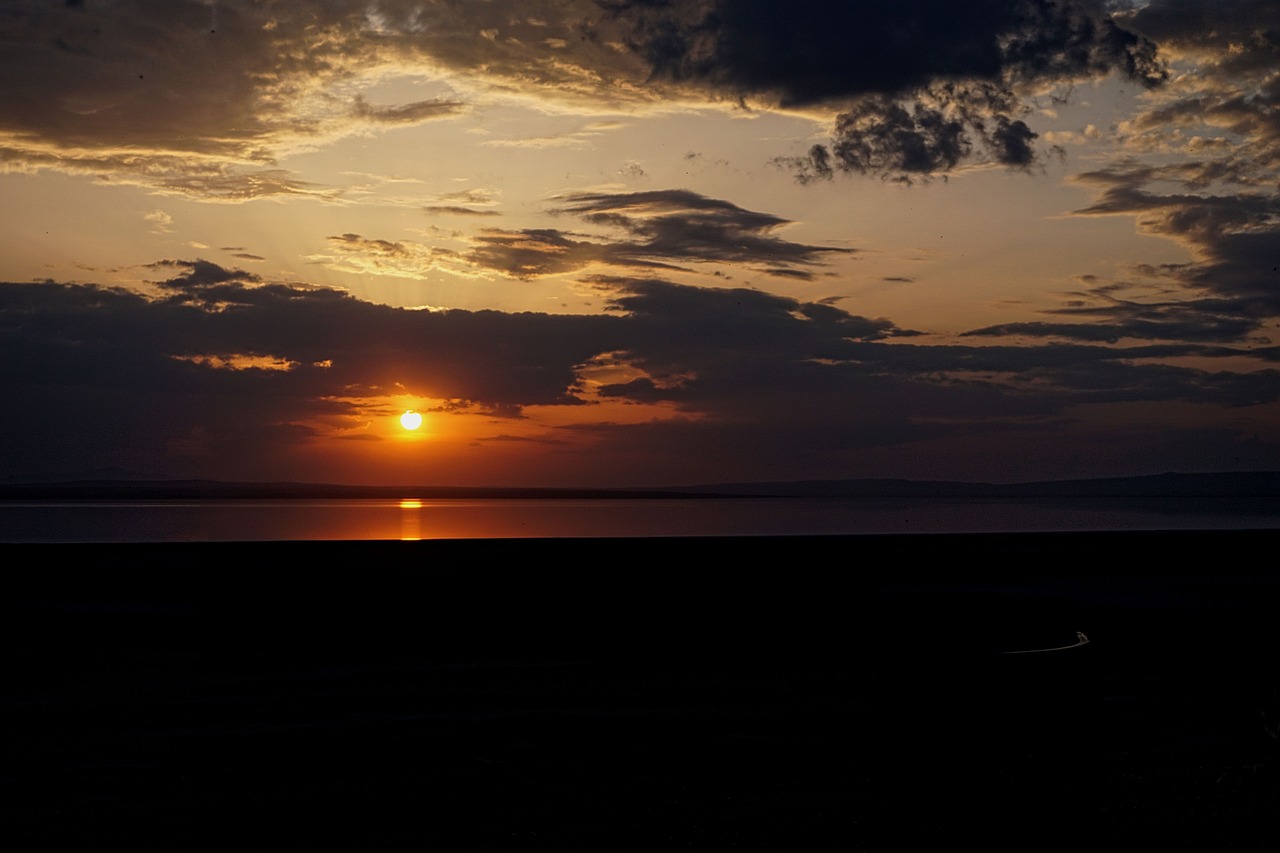 the sun is setting over a body of water, sōsaku hanga, vast expanse, the best photograph of august, no words 4 k, dark setting