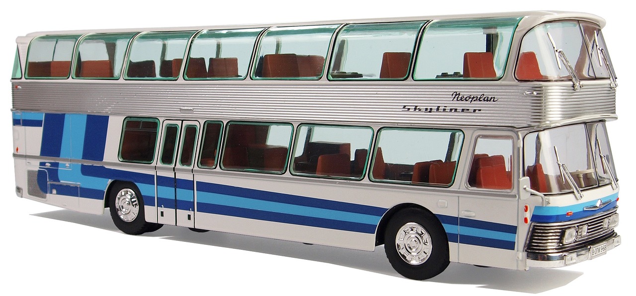 a silver and blue double decker bus on a white surface, by Wayne England, flickr, modernism, shaped like a yacht, catalog photo, replica model, rhythm