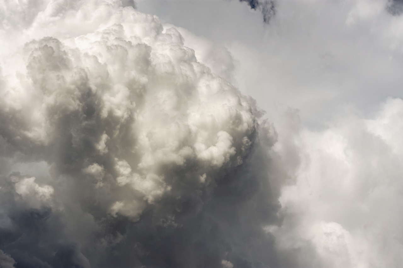 a jetliner flying through a cloudy sky, a portrait, by Emanuel de Witte, conceptual art, giant cumulonimbus cloud, detailed zoom photo, 2 0 1 1, thunderstorm outside