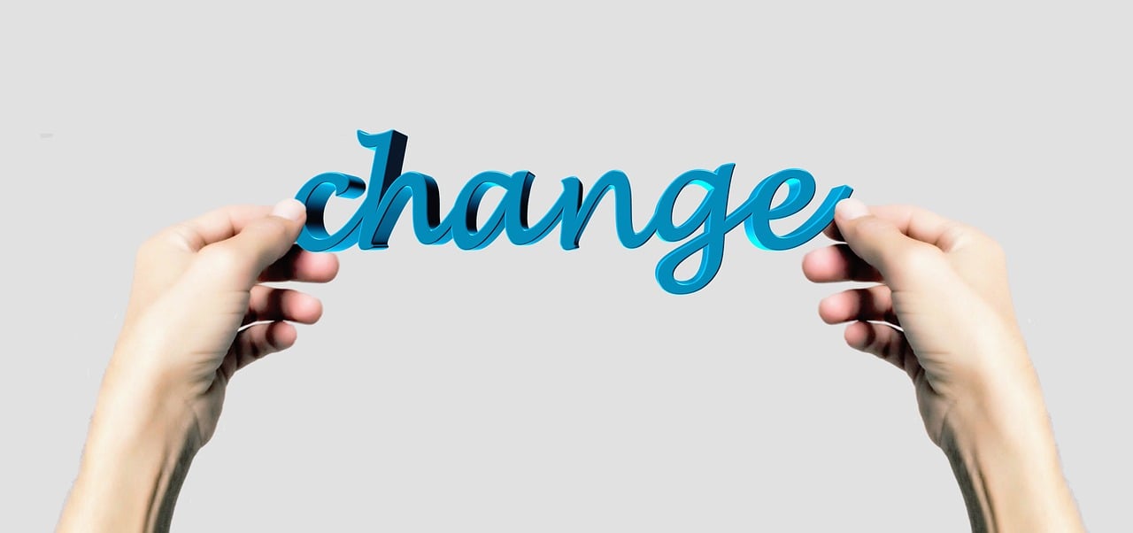 a person holding up a sign that says change, a digital rendering, by Jeanna bauck, trending on pixabay, exchange logo, blue image, flowing lettering, silver