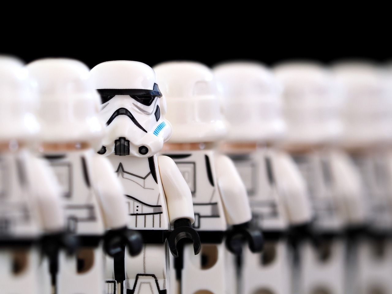 a group of lego stormtroos standing next to each other, a tilt shift photo, getty images, imperial portrait, 3 4 5 3 1, white helmet