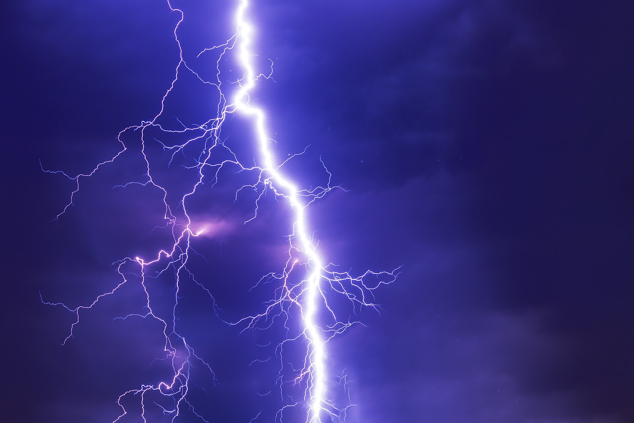 a close up of a lightning bolt in the sky, a stock photo, blue and purle lighting, extremely detailed photo, very accurate photo, outdoor photo