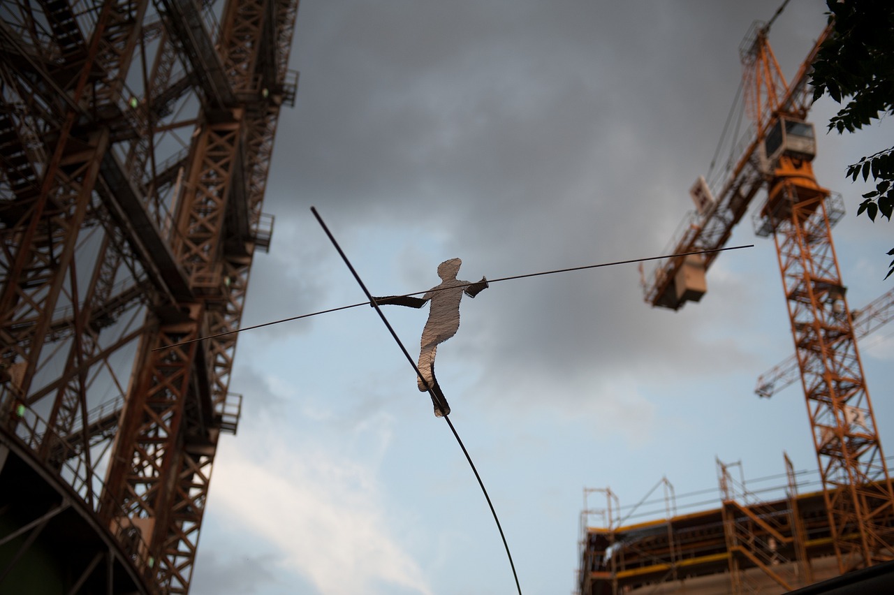 a close up of a person on a tight rope, by Erwin Bowien, figuration libre, under construction, brazilian, atmospheric ”