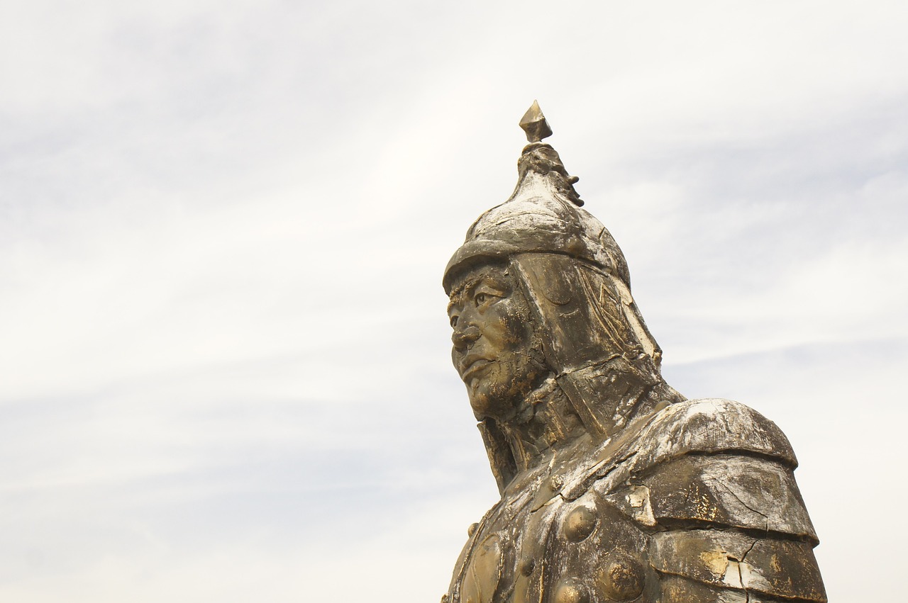 a statue of a man with a bird on top of his head, a statue, new sculpture, photo of genghis khan, highly detail wide angle photo, face of an armored villian, south east asian with round face