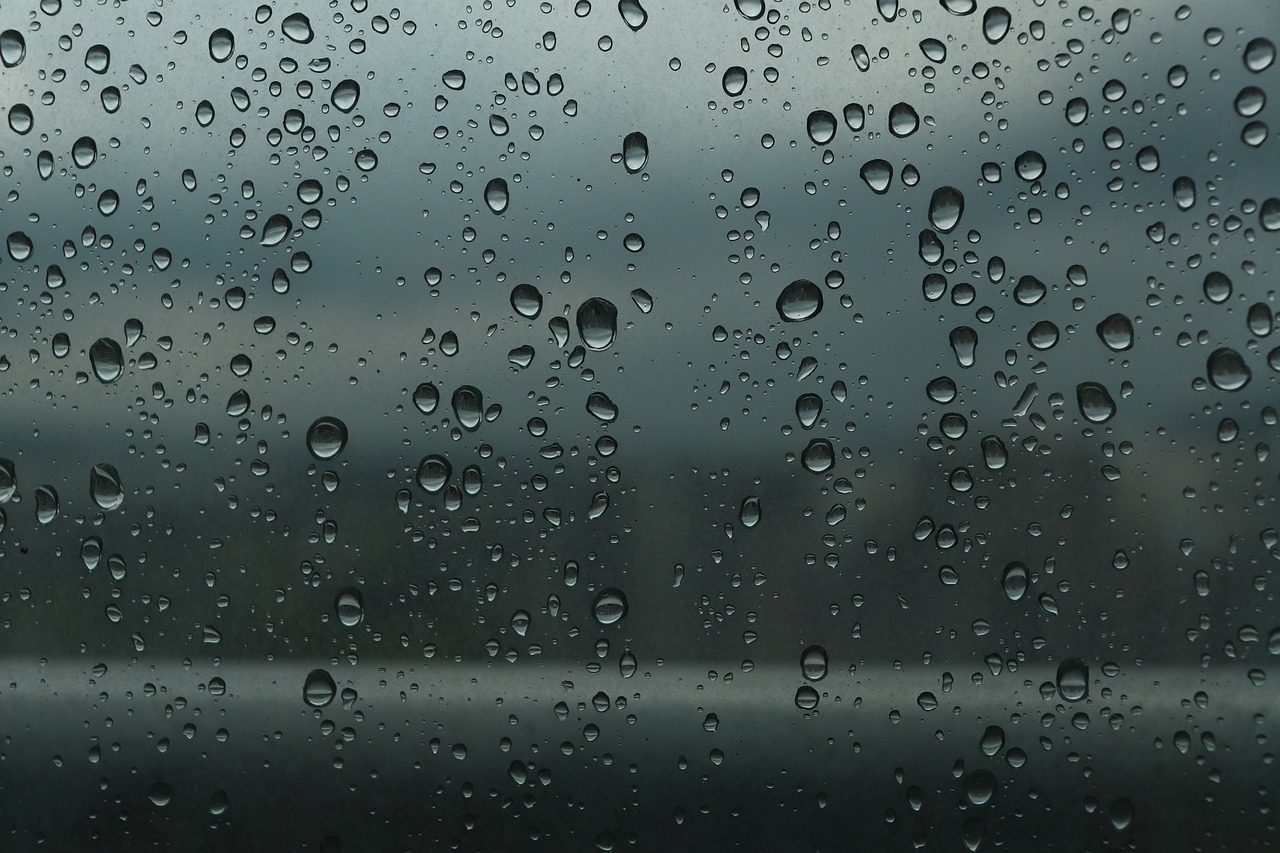 a close up of water droplets on a window, a picture, minimalism, inside of a car, gloomy weather. hyperrealistic, overcast lake, hyperdetailed photo