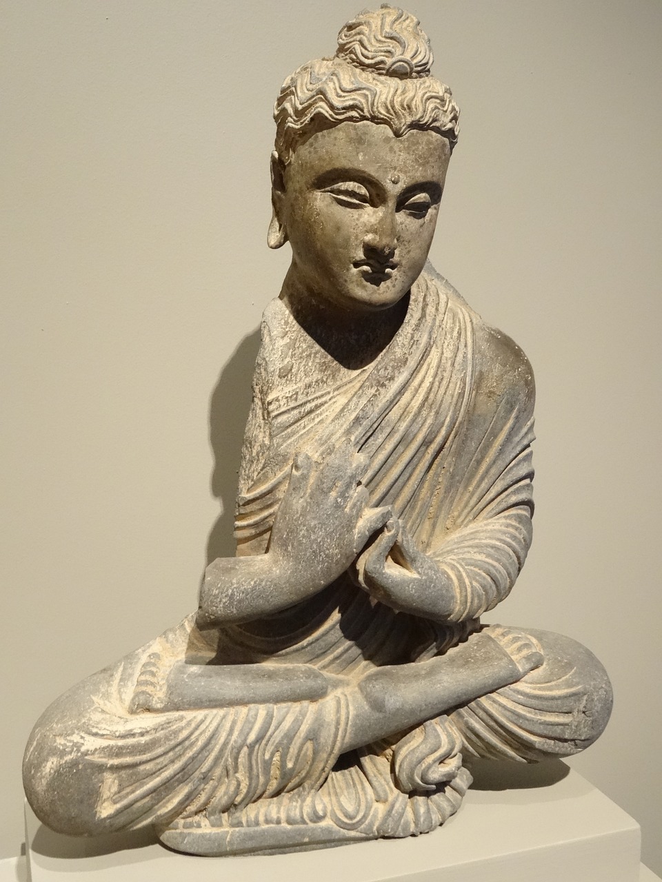 a statue of a person sitting in a meditation position, inspired by Li Di, flickr, classical antiquities on display, moma, 1 4 8 0 s, peaceful and graceful